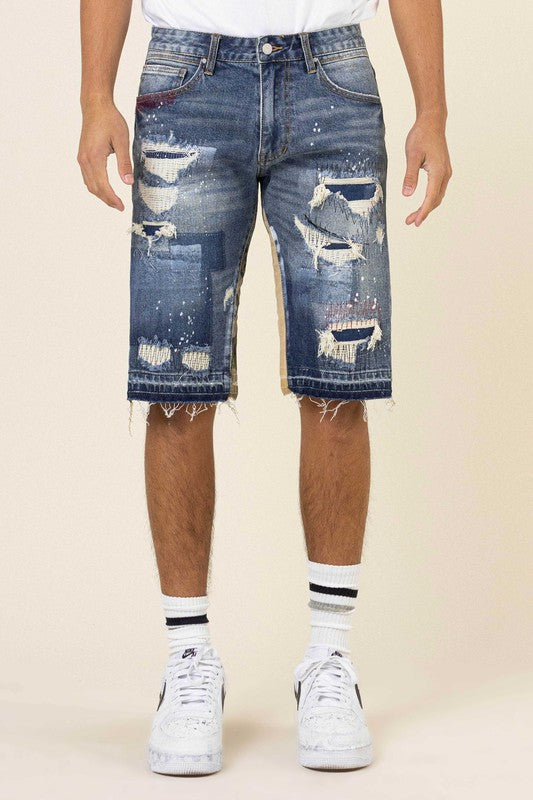 MULTI CAMO PANELED RELEASED HEM DENIM SHORTS