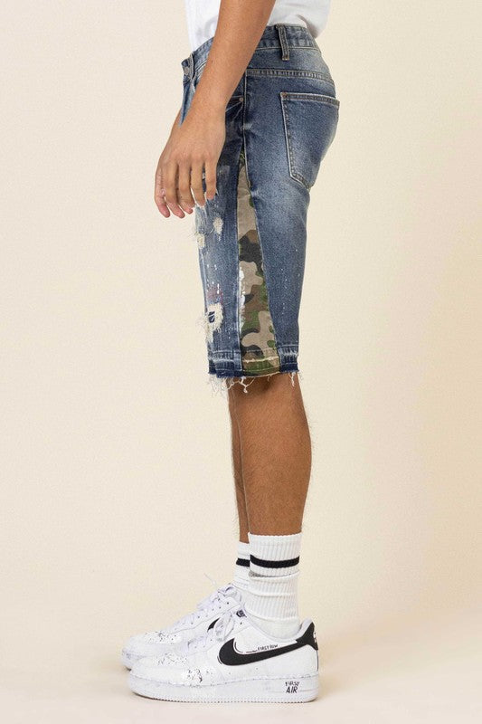 MULTI CAMO PANELED RELEASED HEM DENIM SHORTS