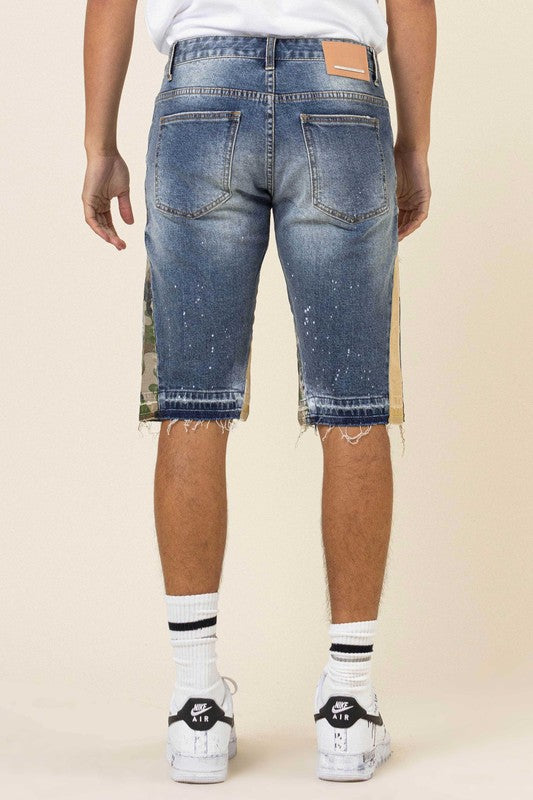 MULTI CAMO PANELED RELEASED HEM DENIM SHORTS