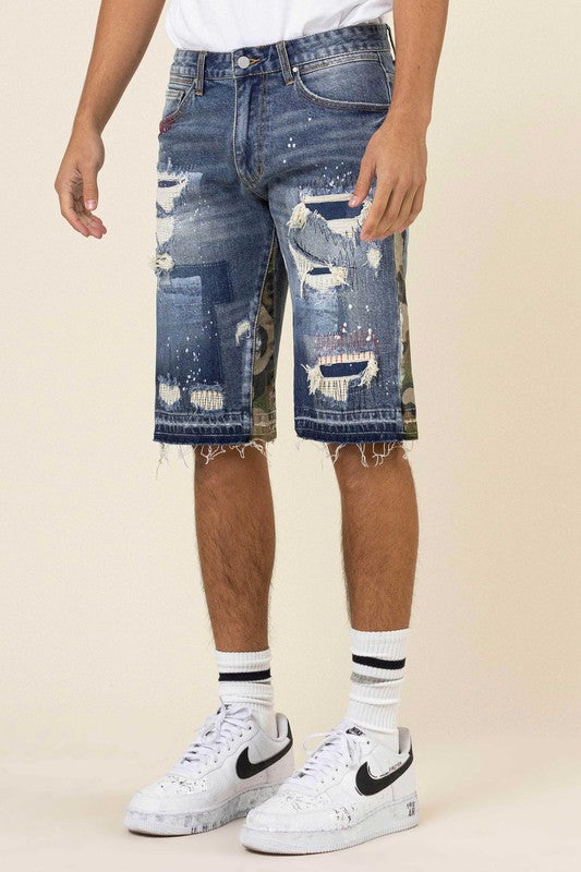 MULTI CAMO PANELED RELEASED HEM DENIM SHORTS